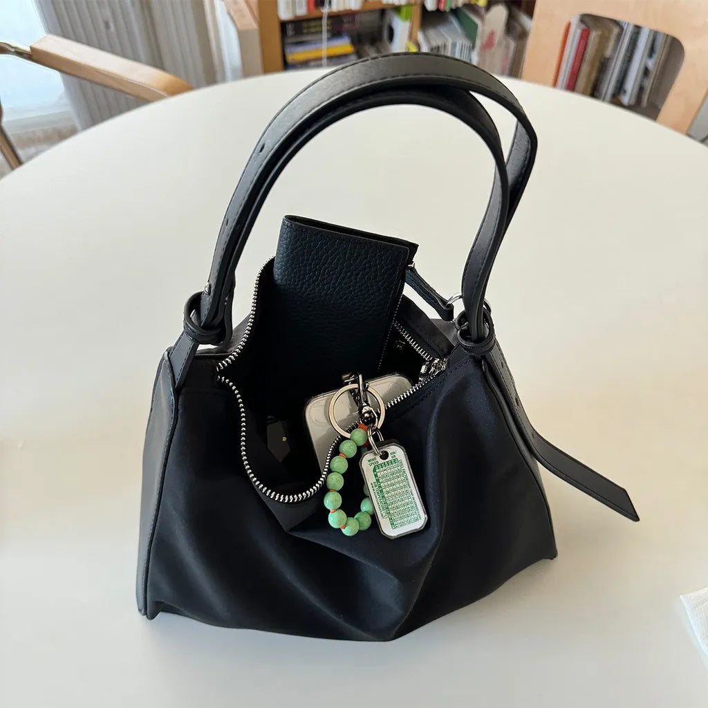 Poik Strap Shoulder Bag